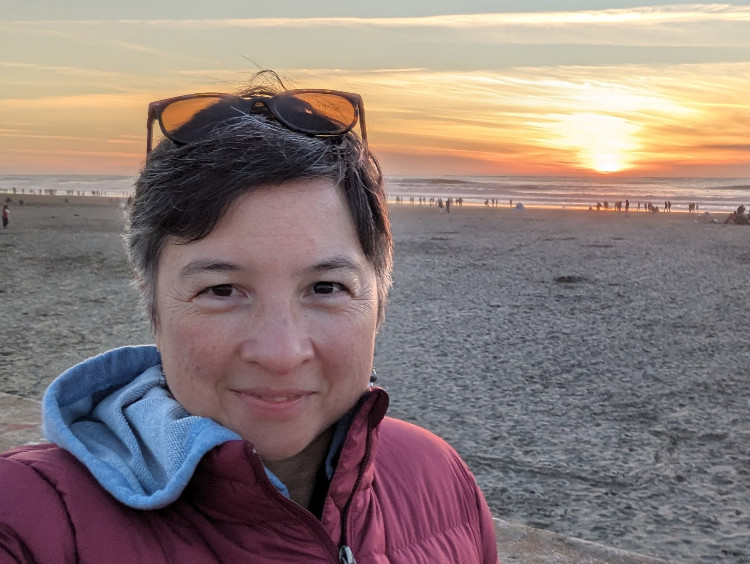 Elizabeth at San Francisco's Ocean Beach at sunset on New Year's Day, 2024